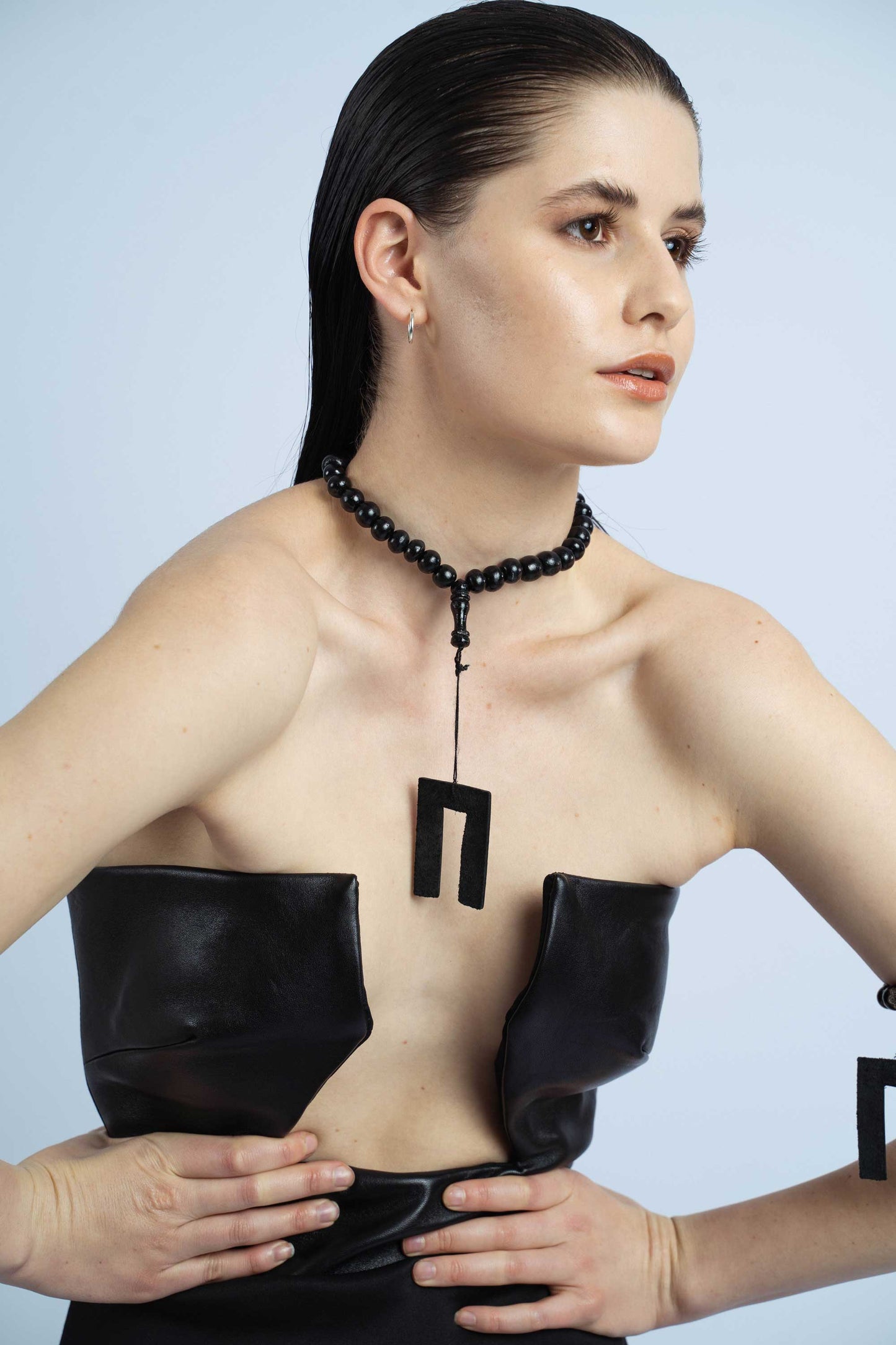 P6559 ARTEMIDA, GENUINE LAMB LEATHER, STRUCTURED BLACK ZIP, OPEN BUSIER MINI DRESS COMBINED WITH STRETCH BOTTOM FABRIC